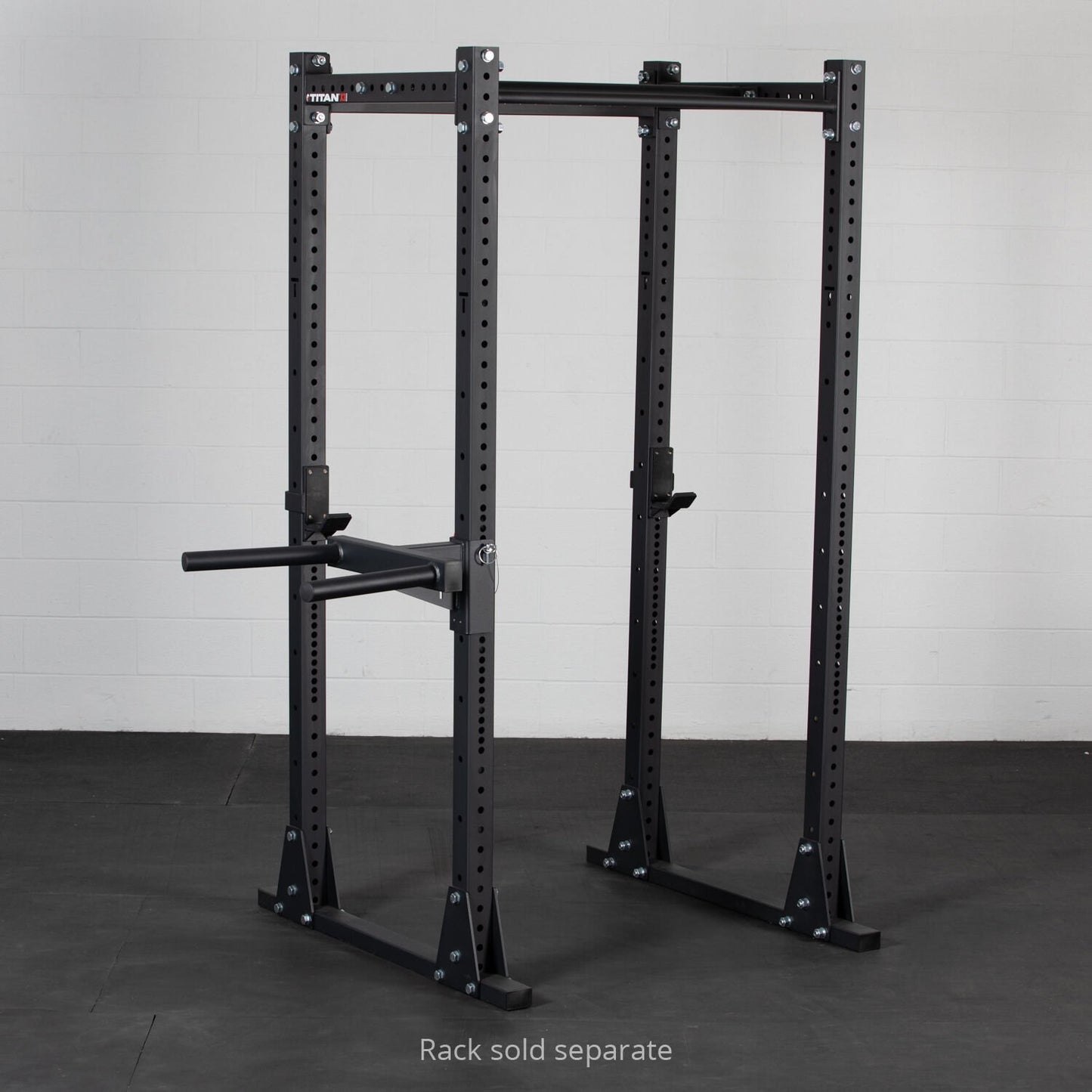 A heavy-duty, black steel Titan Fitness X-3 Series Y-Dip Attachment power rack; suitable for home or commercial gym setups for secure weightlifting and dip station exercises. - view 2