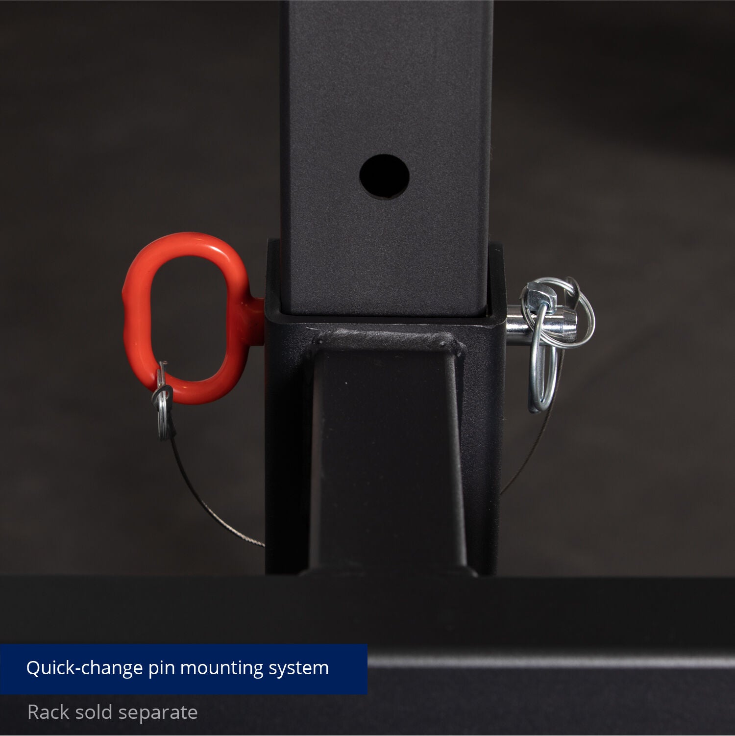 Quick-change pin mounting system featured on a Titan Fitness X-3 Series Y-Dip Attachment with a red carabiner and a safety pin; additional equipment sold separately. Compatible with the Titan Fitness X-3 Series Y-Dip Station